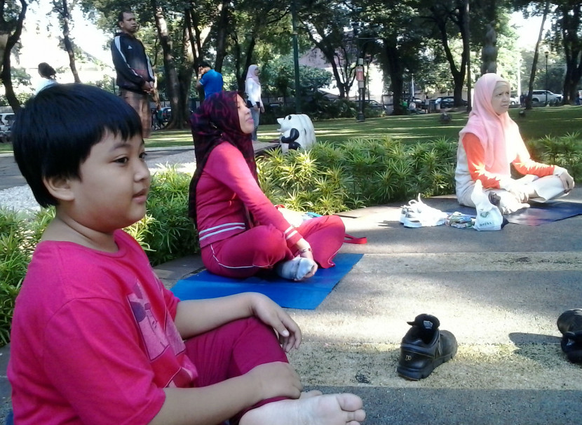 Komunitas Falun Dafa; Berikan Meditasi Gratis di Taman Suropati