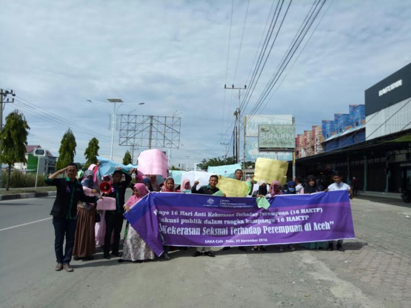 Aksi Komunitas Flower Aceh Peringati Hari Anti Kekerasan Terhadap Perempuan